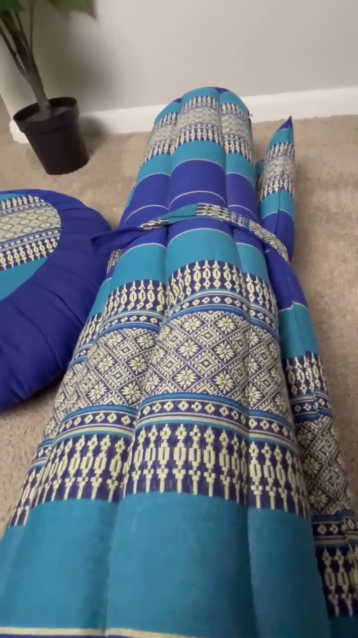 Still from a product video for Leewadee massage mats