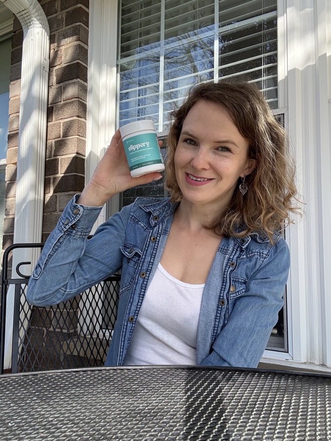Drink product held up outdoors during a lifestyle shoot