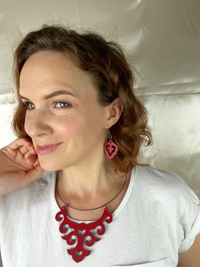 Statement necklace and earrings worn for an accessories shoot